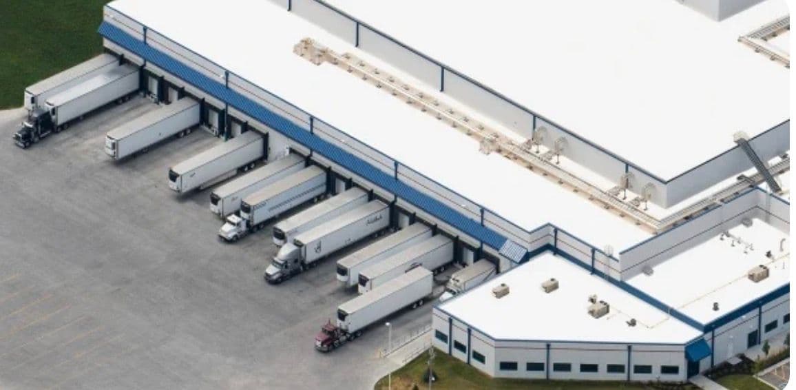 Trailers loading at a distribution centre's dock doors