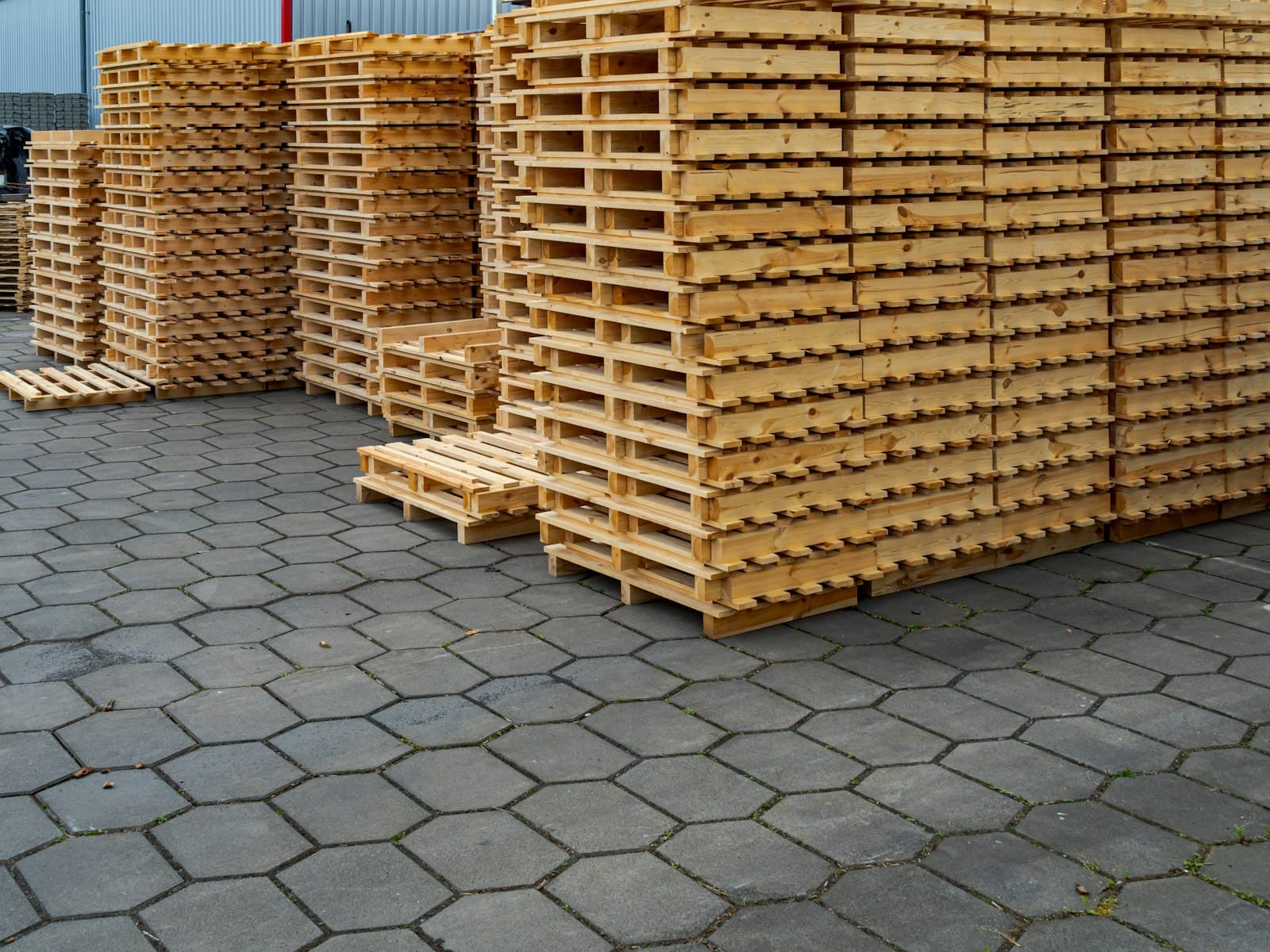 Stacked pallets in a yard
