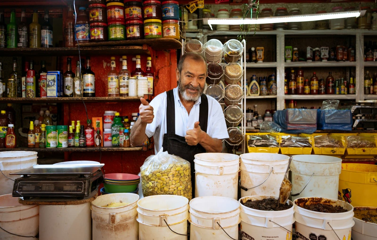 A vendor at his market stall