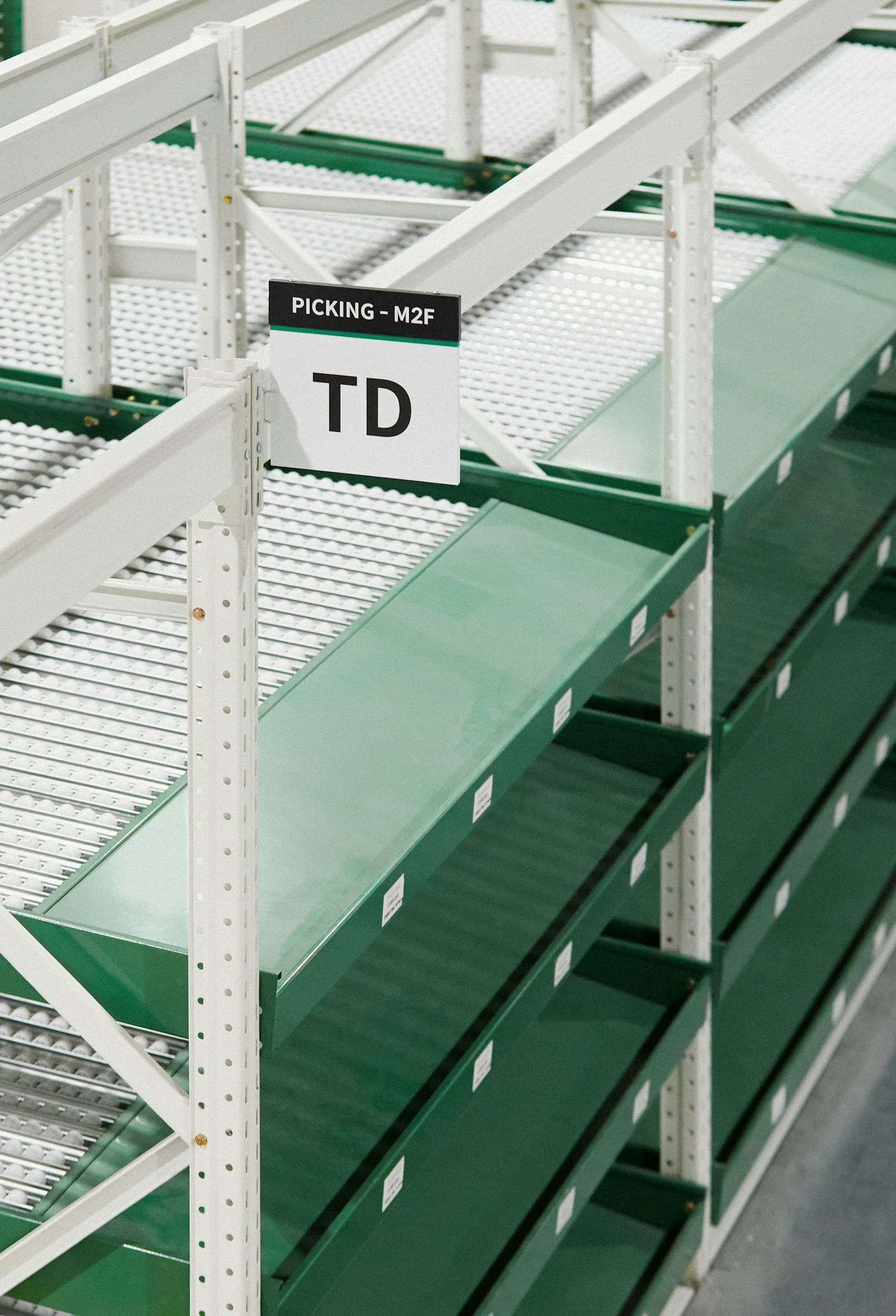 Cases stored on warehouse shelving
